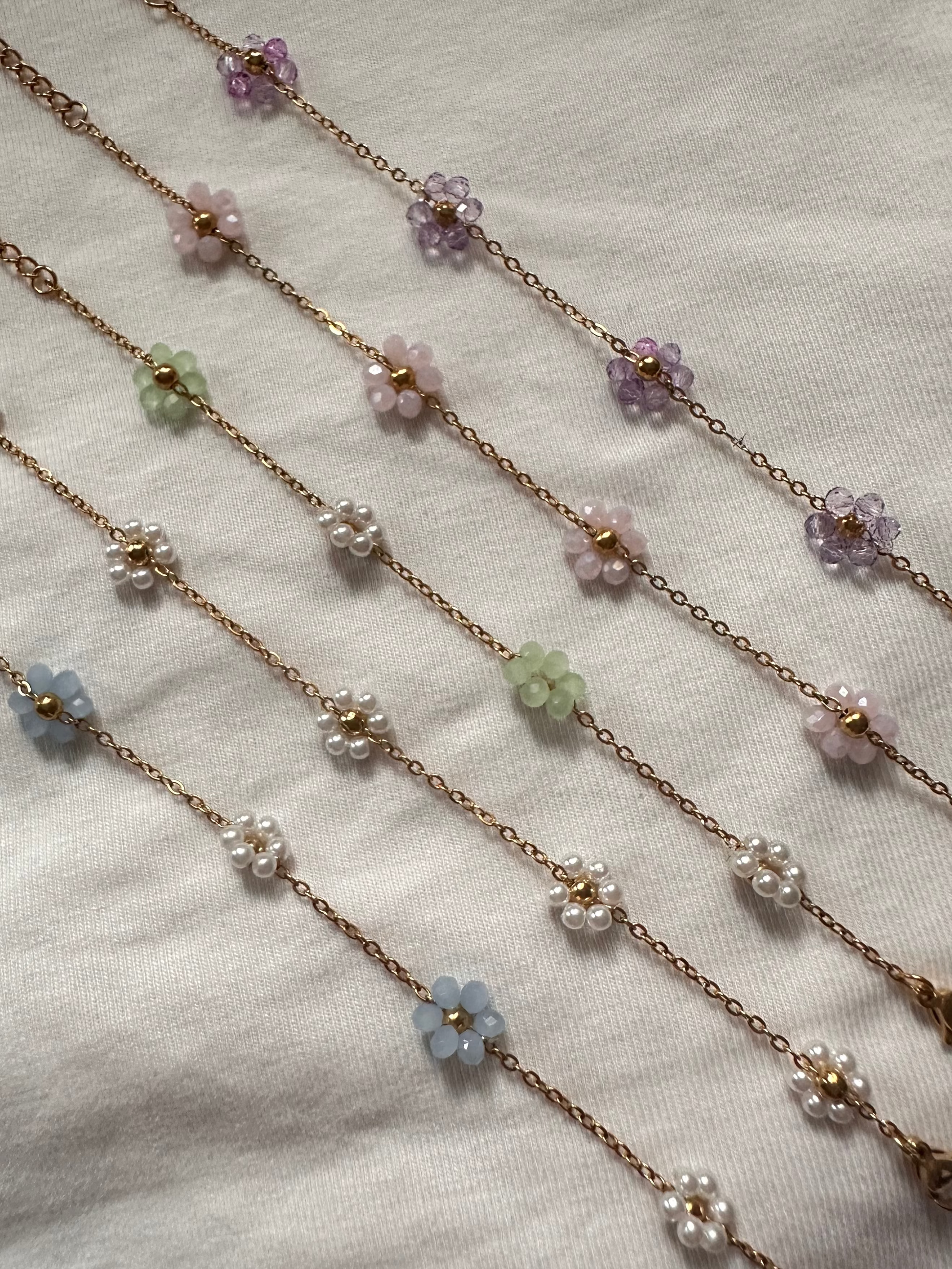 Pastels. Top to bottom: Purple, pink, green + pearl, pearl, blue + pearl