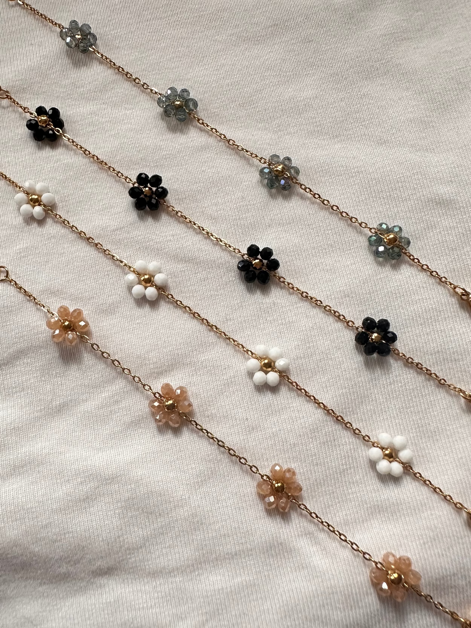 Neutrals. Top to bottom: Gray, black, white, champagne